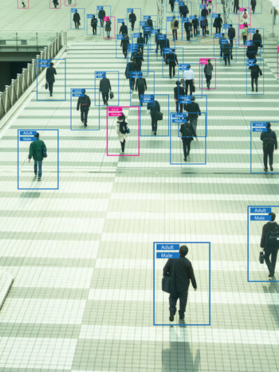 View of people from afar with human recognition markers around them