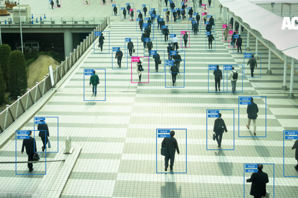 View of people from afar with human recognition markers around them