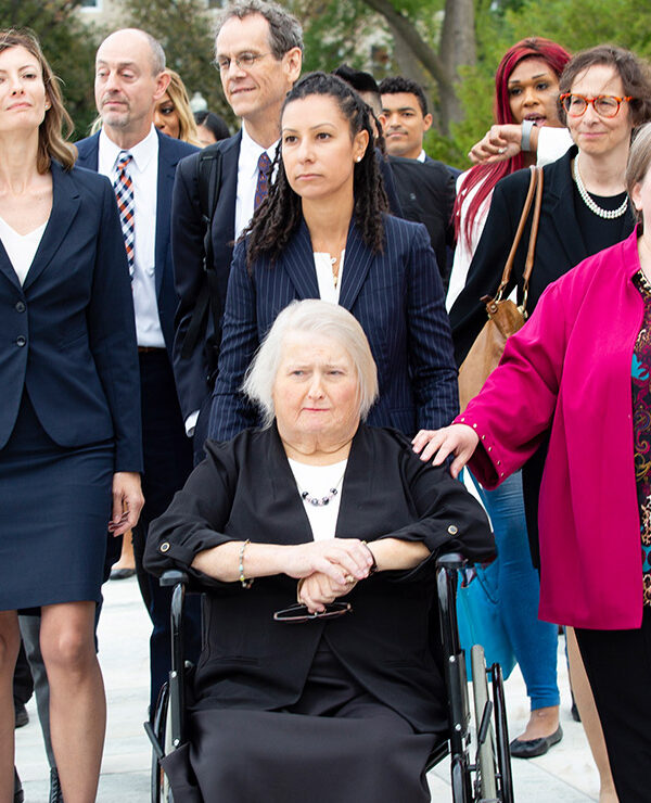 Aimee Stephens with her wife and legal team outside the Supreme Court.