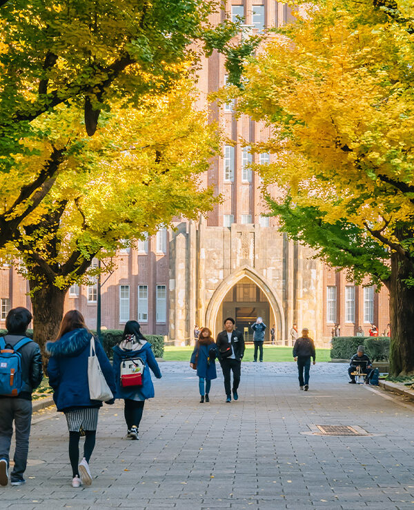 Students walking on a college campus.