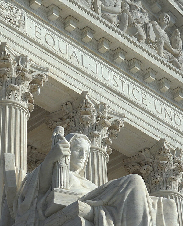 "Equal Justice Under Law" engraving above entrance to US Supreme Court Building.