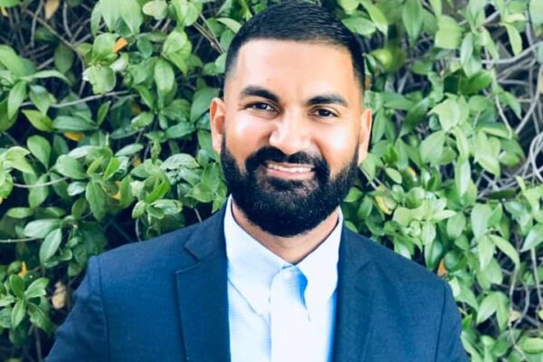 Executive Director Athar Haseebullah in front of white background