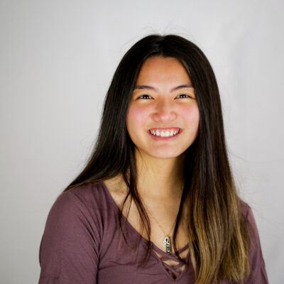 Leora in front of white background