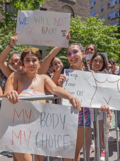 abortion protest with pride flags
