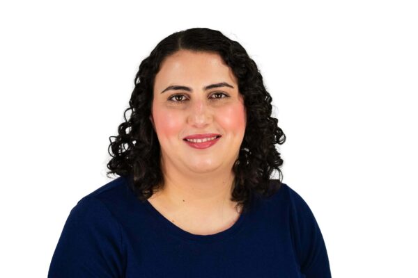 Danielle Bennett headshot in front of white background.