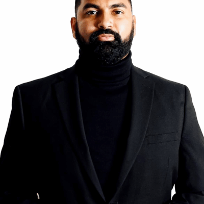 Athar Haseebullah in front of white background.