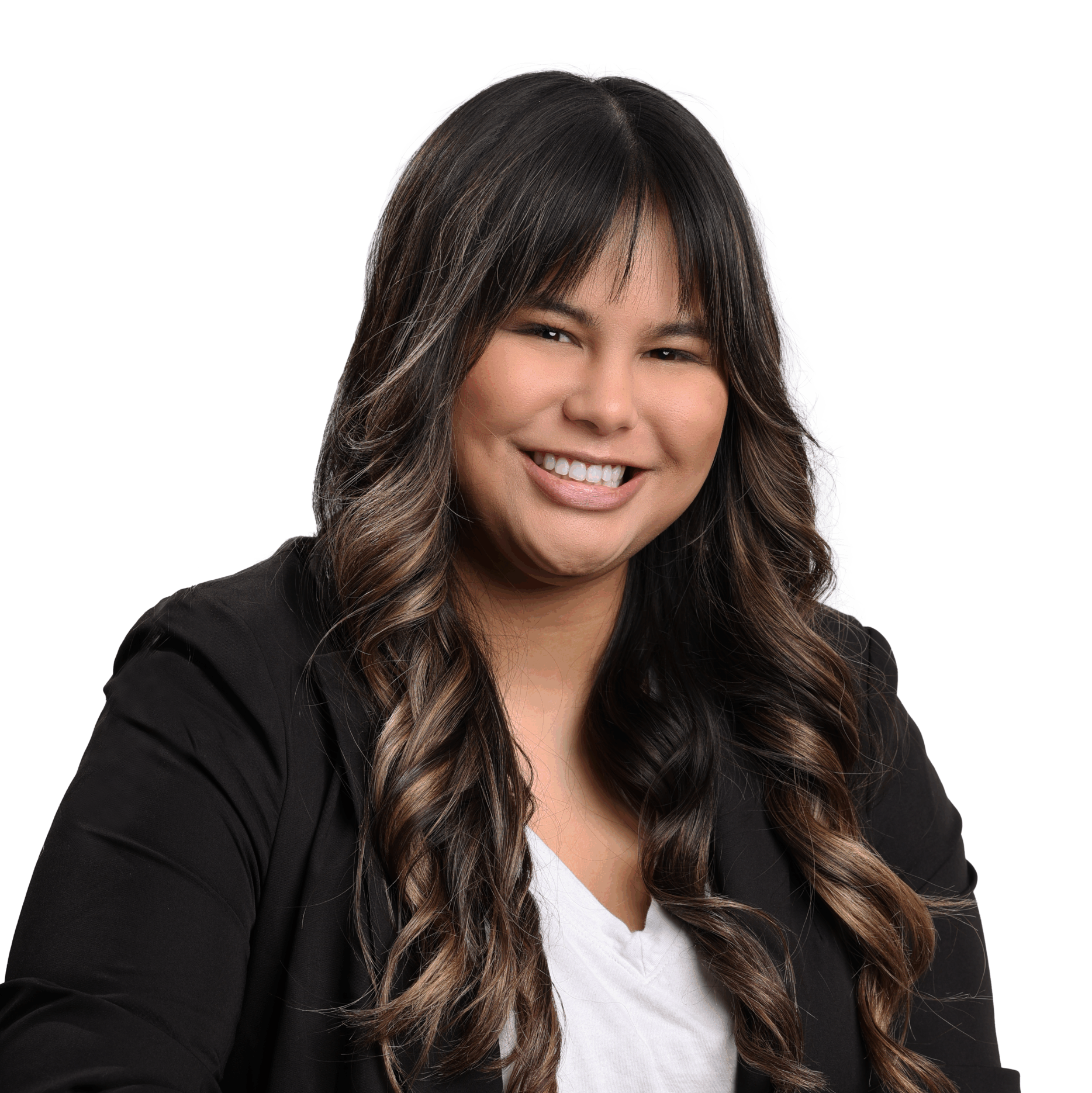 Headshot of Jordyn. She is wearing a white shirt and a black blazer. She is a brown woman with long brown hair and bangs.