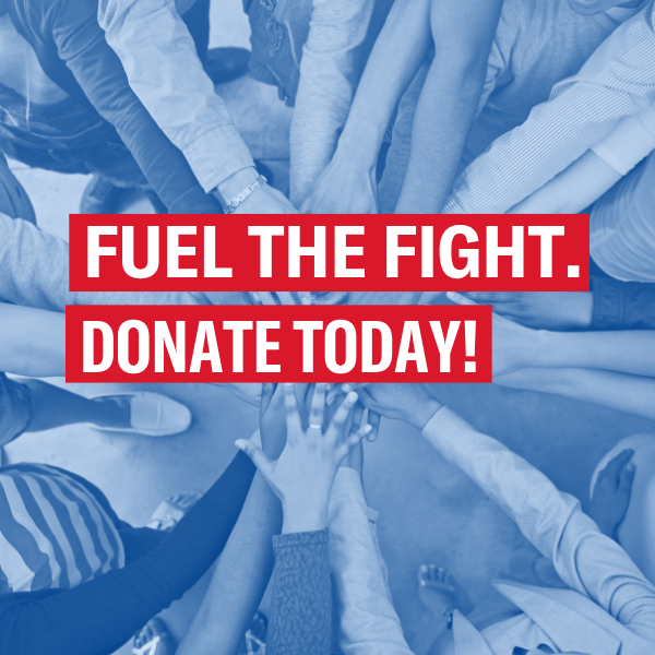 A group of diverse hands stacked together in a gesture of unity and support, overlaid with bold red banners. The white text on the banners reads “FUEL THE FIGHT. DONATE TODAY!” The image has a blue tint, emphasizing solidarity and a call to action.