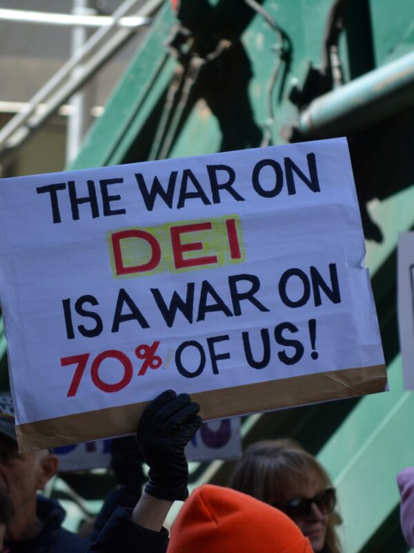A protest sign that reads, "the war on DEI is a war on 70% of us!"