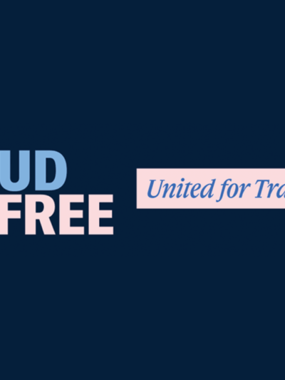 Stylized text that reads "Proud and Free, United for Trans Power"