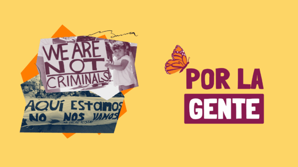 ACLU of Nevada Por La Gente. Little girl holding a sign that reads "We are not criminals."