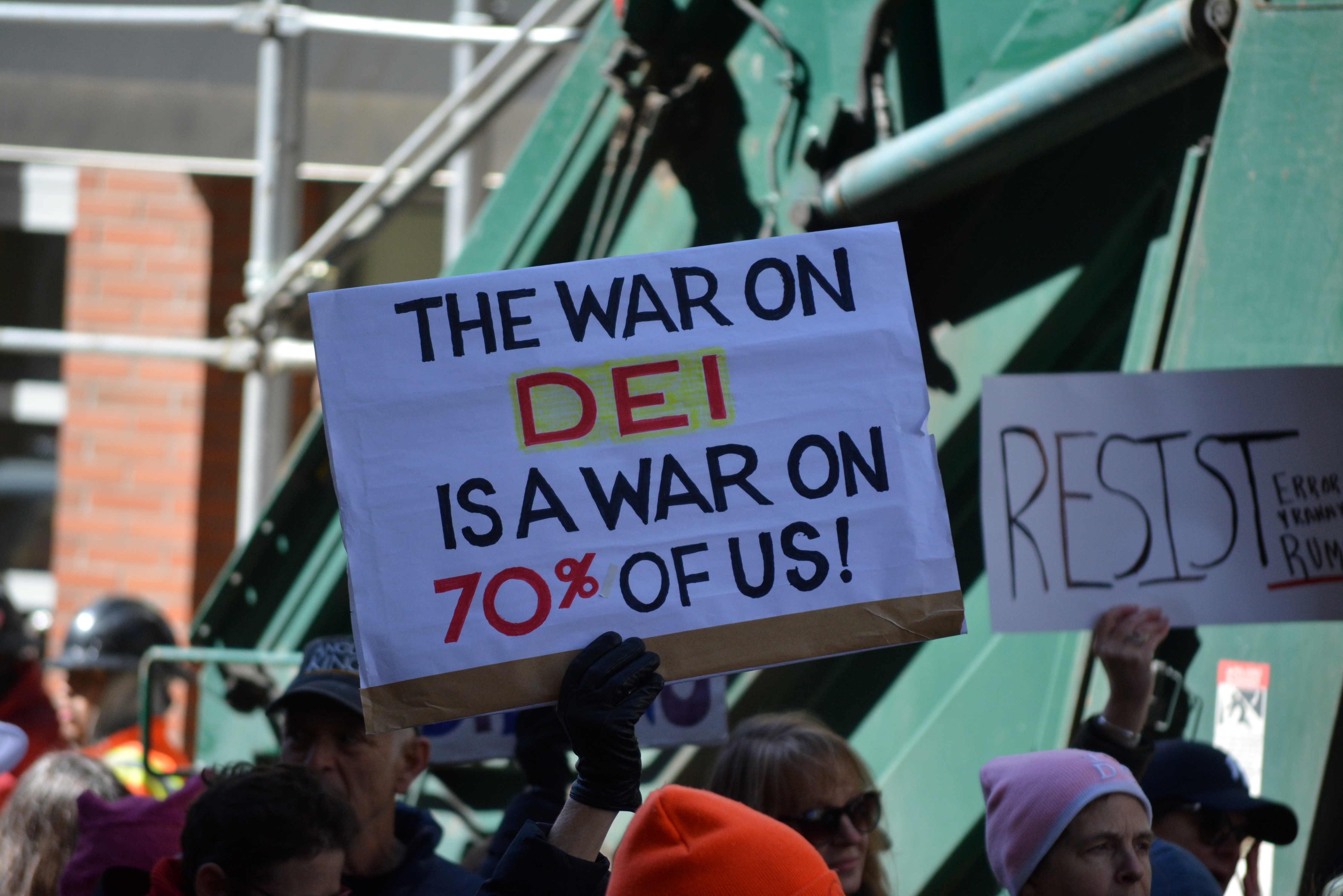 A protest sign that reads, "the war on DEI is a war on 70% of us!"