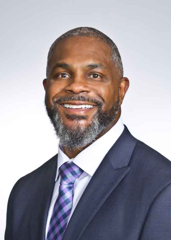 Dwayne McClinton in front of right background