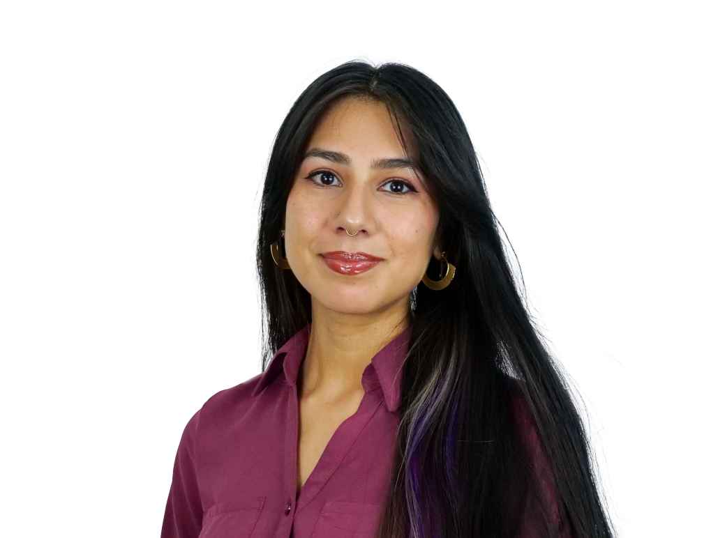 Marilyn Morales in front of white background