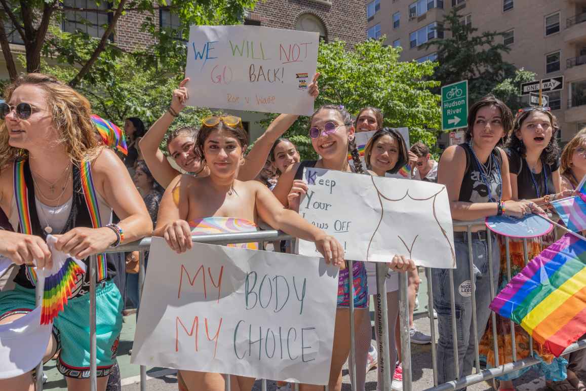 abortion protest with pride flags